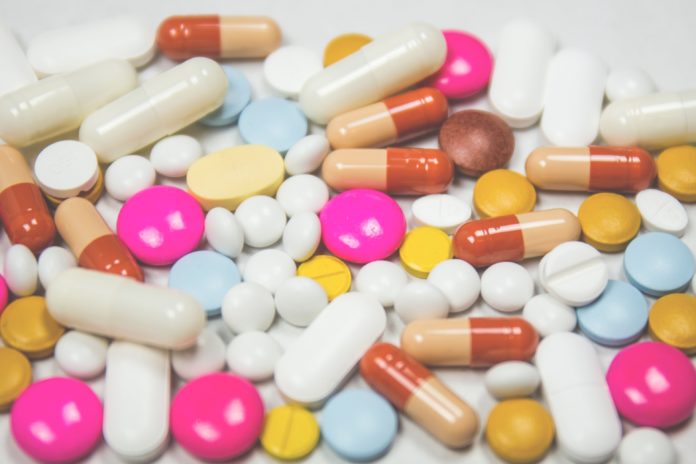 Pills and capsules of various bright colors